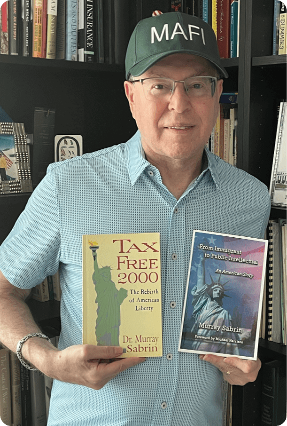 A man wearing a MAFI hat holding two books.